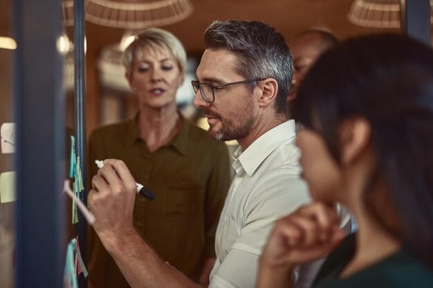 businessman team writing planning schedule brainstorming collaboration strategy meeting office man employee leadership presentation training staff teamwork project 590464 189121
